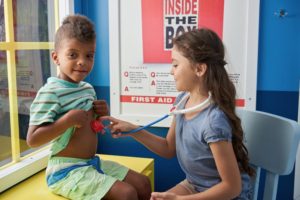 Image of two children playing with stethoscope