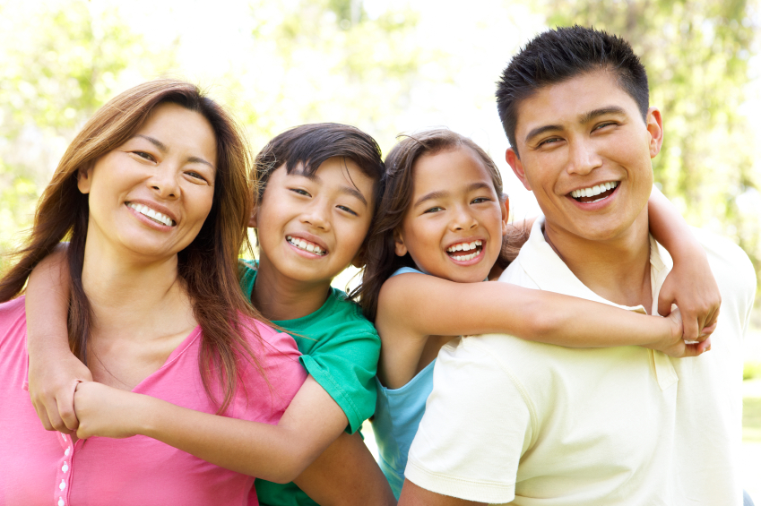 Family Enjoying Day In Park