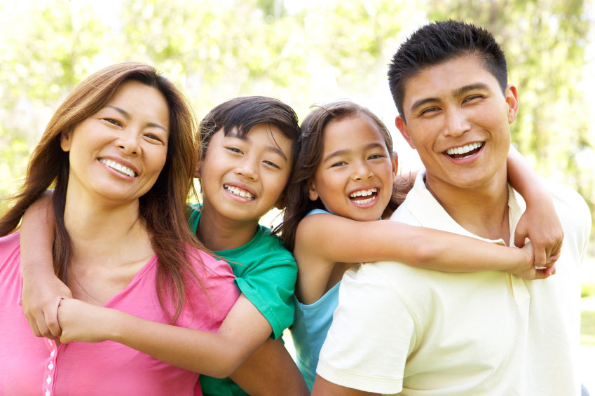 Image of family smiling