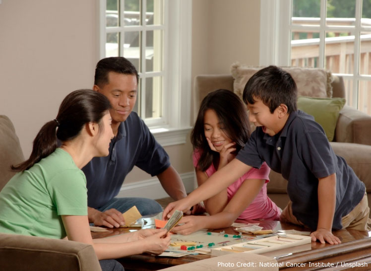 A family playing monopoly.